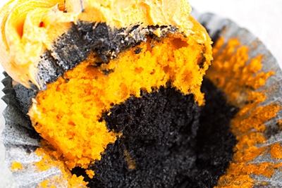 Ghoulishly Orange and Black Halloween Cupcakes on http://www.theculinarylife.com